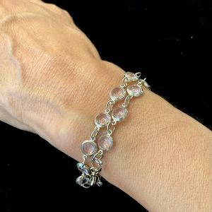 Silver bracelet bezel set light pink jewels